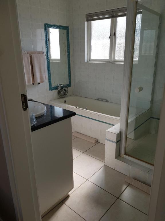 Koupelna v ubytování Ingwe Manor Guesthouse