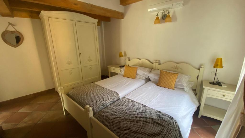 Posteľ alebo postele v izbe v ubytovaní Il Mulino di Hotel Villa Aurora