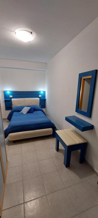 Postel nebo postele na pokoji v ubytování Luna's House Fondachello