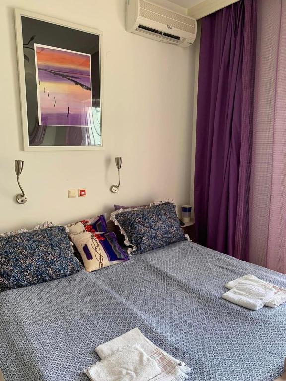 Postel nebo postele na pokoji v ubytování Hotel Villa Anais