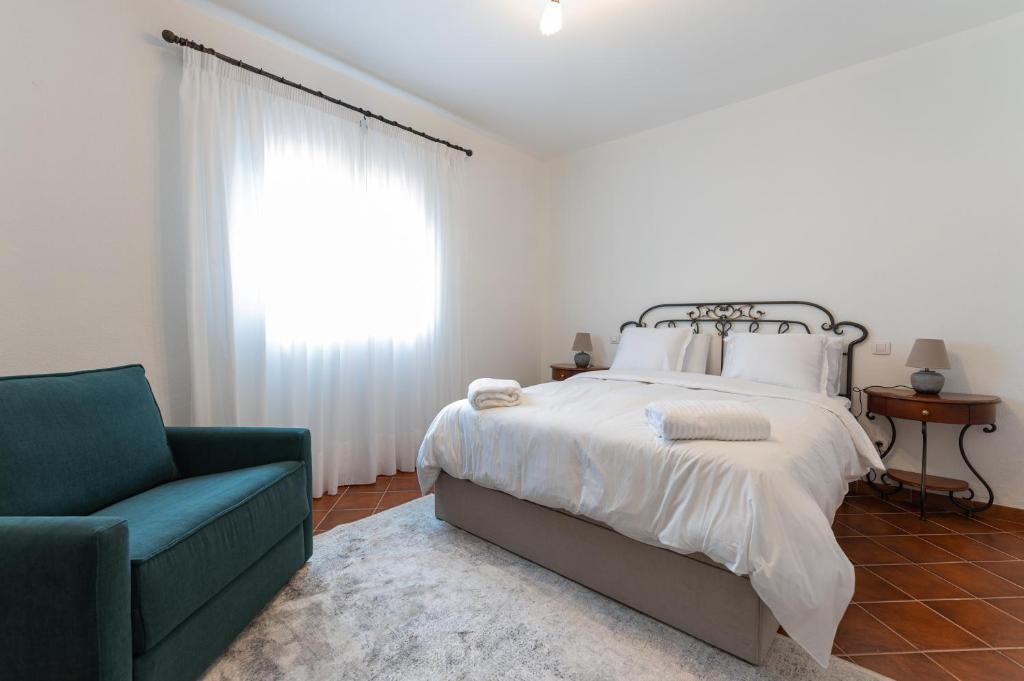Postel nebo postele na pokoji v ubytování Ecofinca Selva Doramas