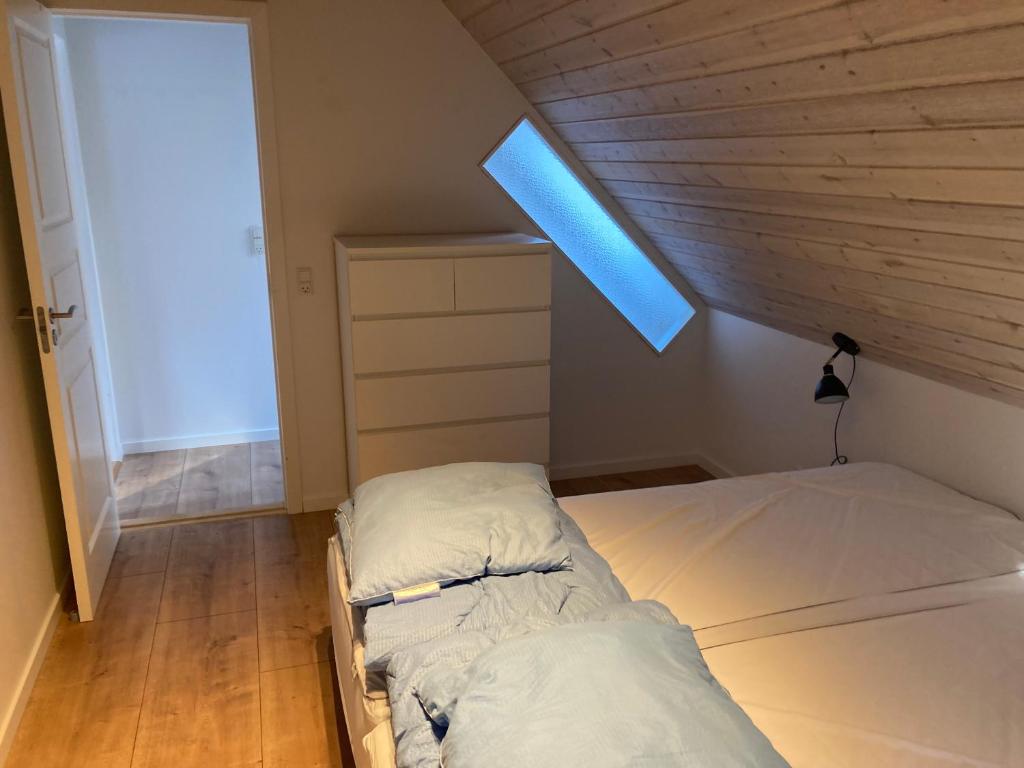 Postel nebo postele na pokoji v ubytování Hegedal Apartment