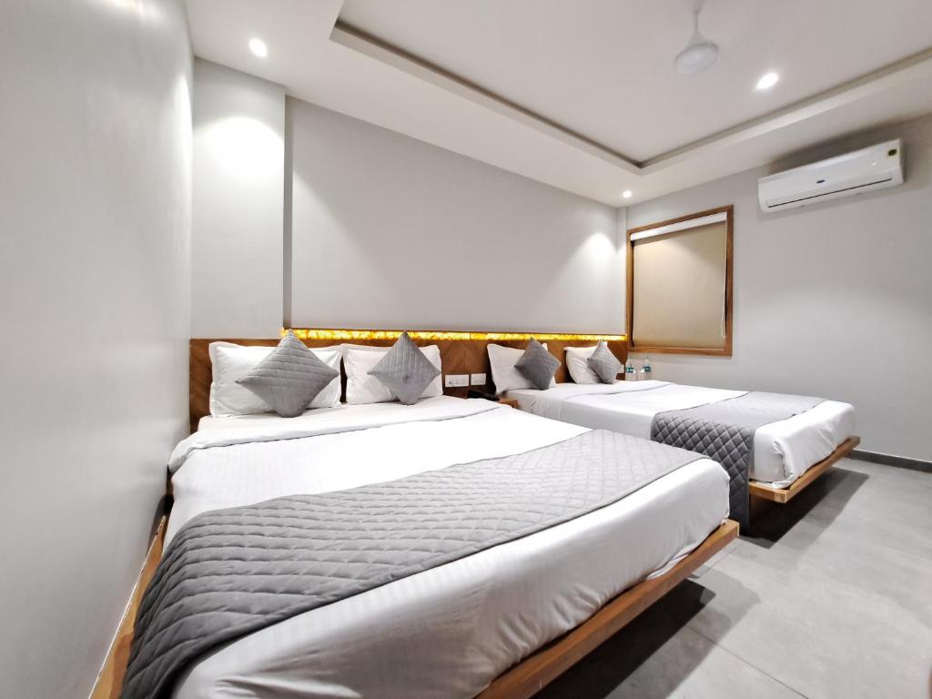 Postel nebo postele na pokoji v ubytování HOTEL OM