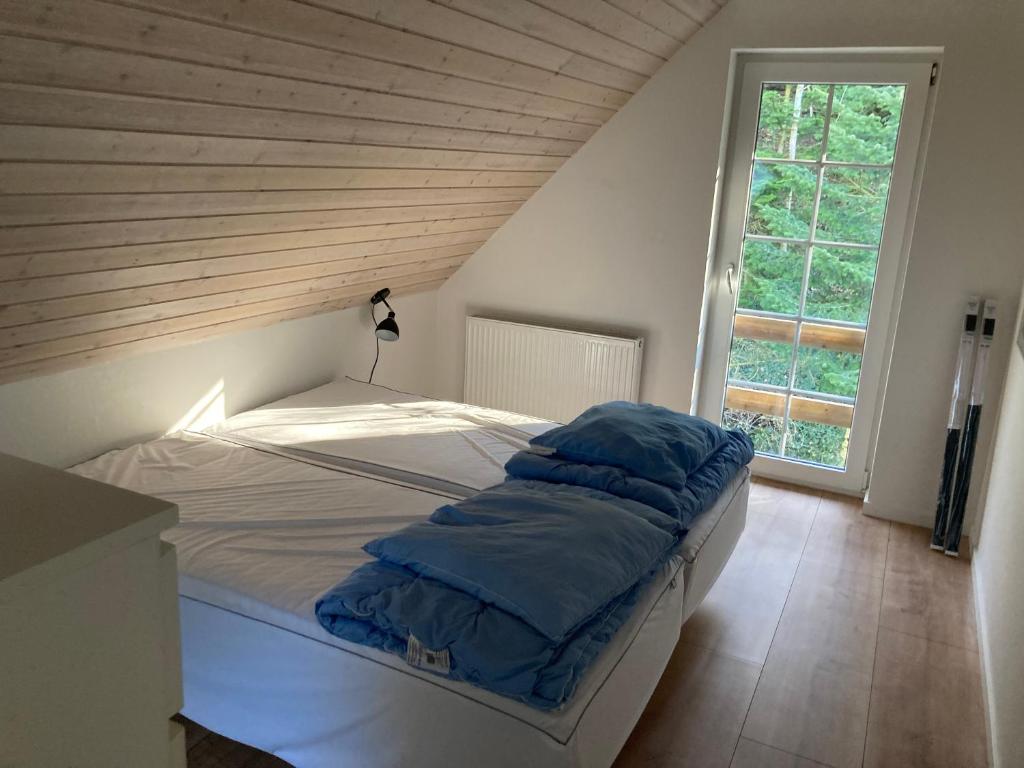 Postel nebo postele na pokoji v ubytování Hegedal Apartment