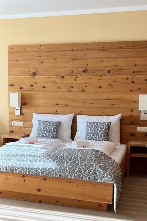 Posteľ alebo postele v izbe v ubytovaní Das AlplResort "ALMfrequenz"