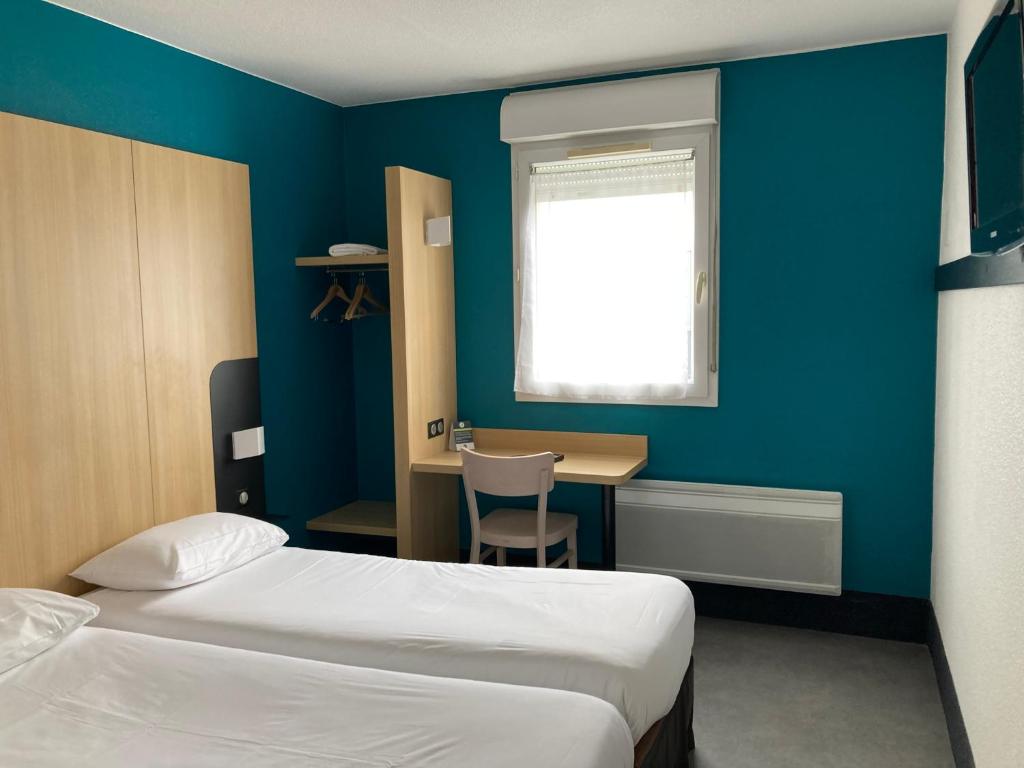 Postel nebo postele na pokoji v ubytování B&B HOTEL Le Tréport Friville