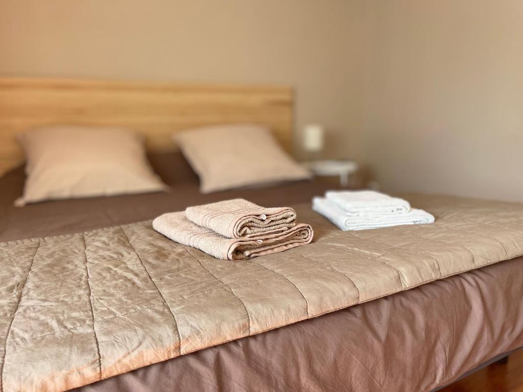 Кровать или кровати в номере Au Perchoir