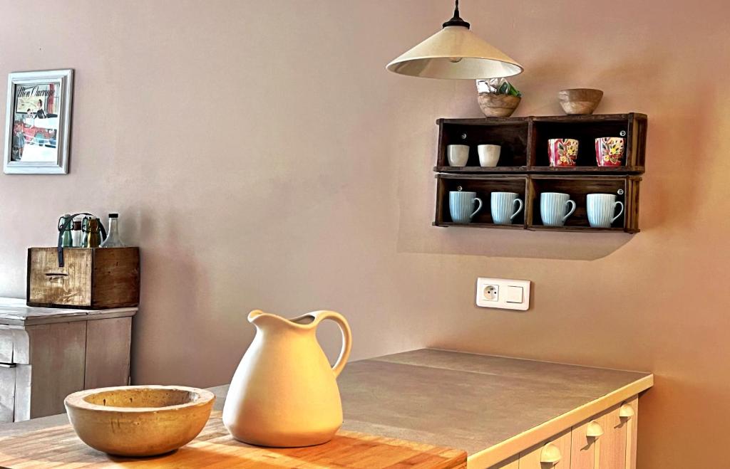 Příslušenství pro přípravu čaje a kávy v ubytování Maison Marie