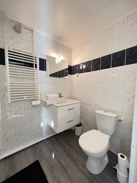 Kúpeľňa v ubytovaní AptCityStay