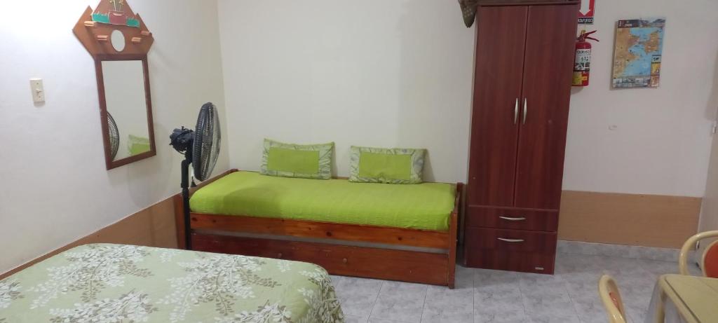 En eller flere senge i et værelse på Monoambiente Cuty Nakey