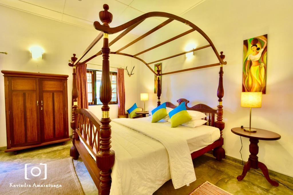 Postel nebo postele na pokoji v ubytování Captain's Bungalow, Kandy
