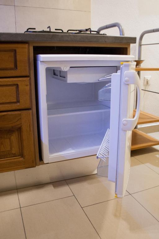 Kuchyňa alebo kuchynka v ubytovaní Carla Studio Apartment