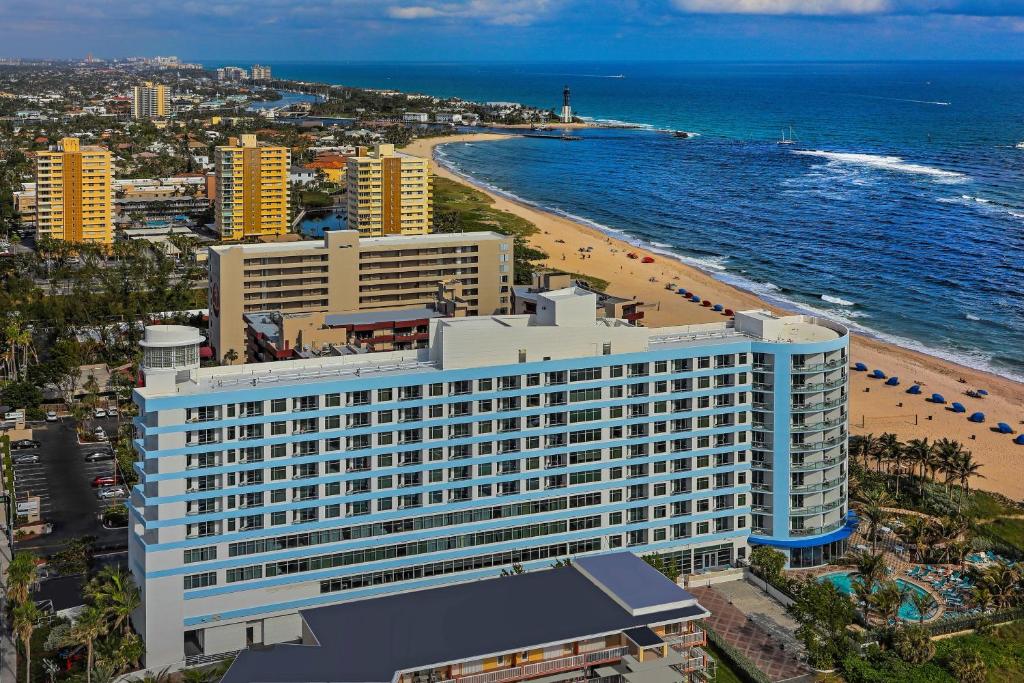 an aerial view of a hotel and the beach at Residence Inn Fort Lauderdale Pompano Beach/Oceanfront in Pompano Beach