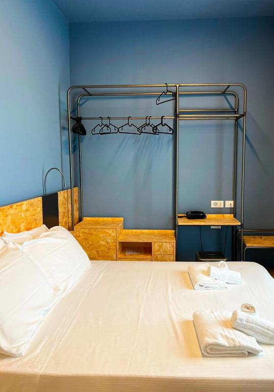Postel nebo postele na pokoji v ubytování Hotel Little