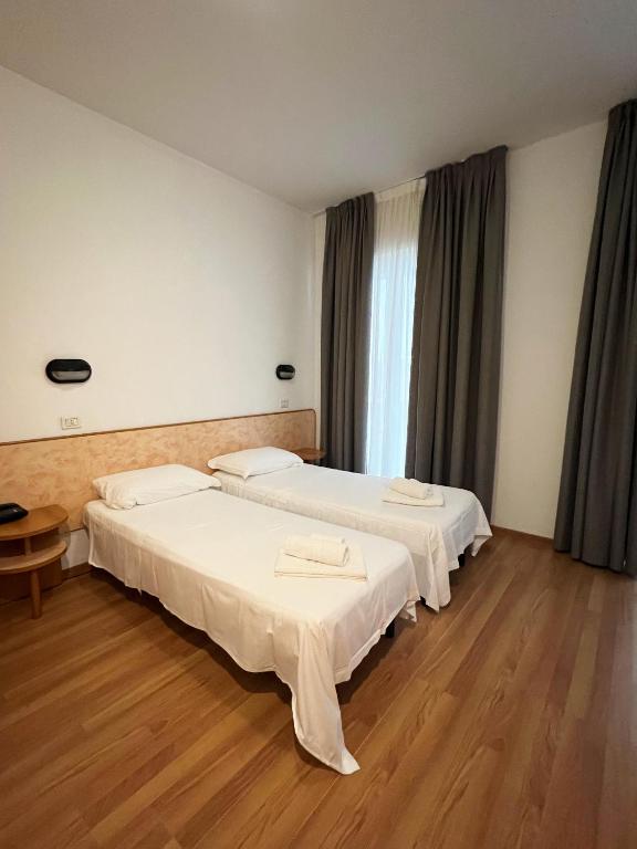 Postel nebo postele na pokoji v ubytování Hotel Little