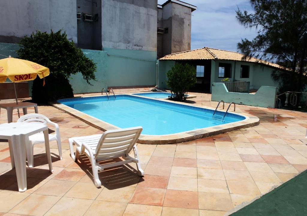Bazén v ubytování Hotel Pousada Oasis nebo v jeho okolí