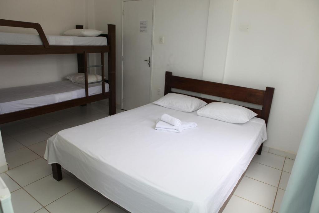 Postel nebo postele na pokoji v ubytování Hotel Pousada Oasis