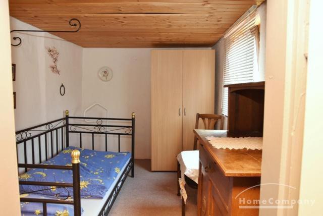 Postel nebo postele na pokoji v ubytování GARNI