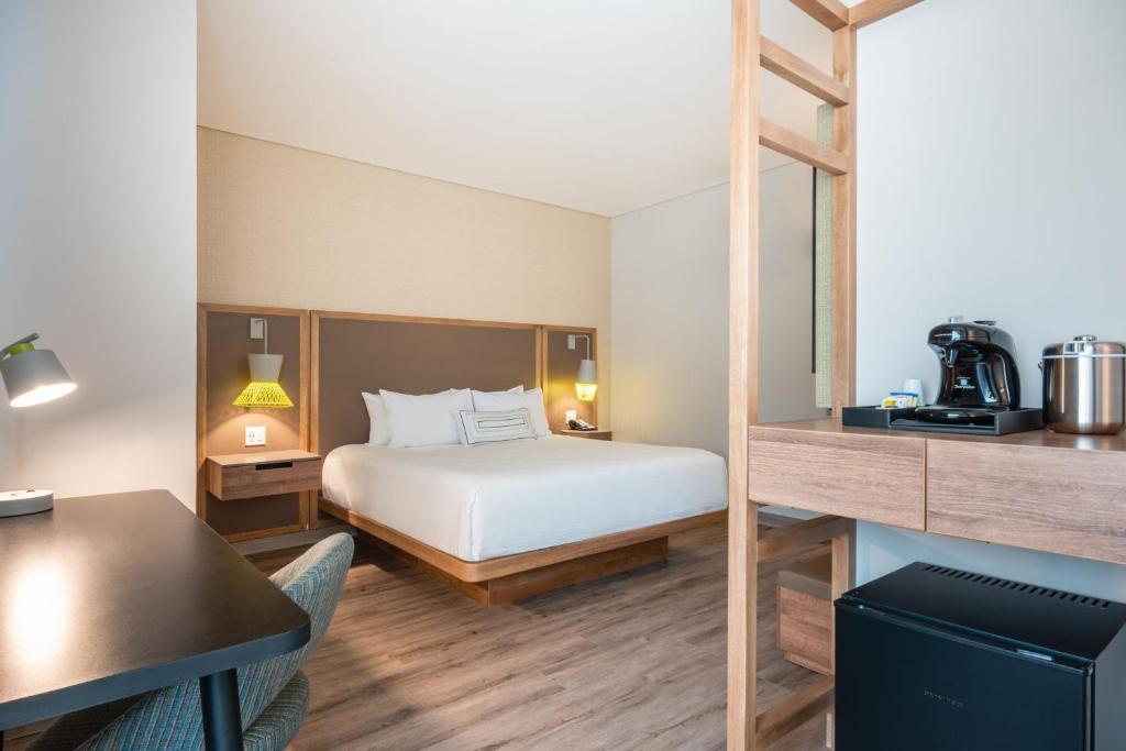 Postel nebo postele na pokoji v ubytování Fairfield by Marriott Medellin Sabaneta