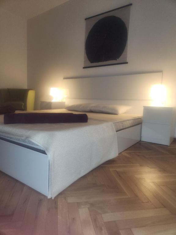 A bed or beds in a room at La Hasienda de Isabela