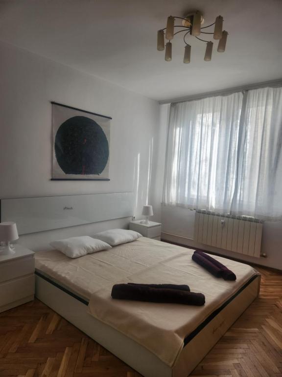 A bed or beds in a room at La Hasienda de Isabela