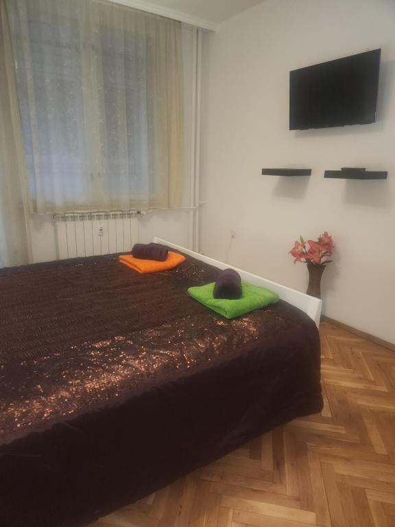A bed or beds in a room at La Hasienda de Isabela