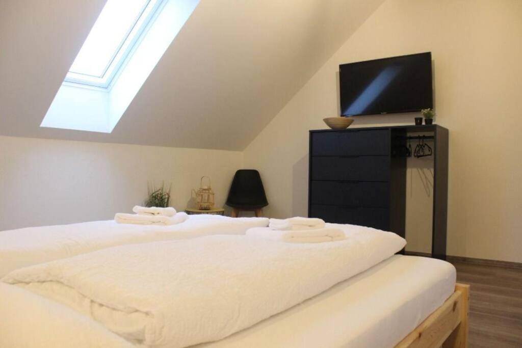 Postel nebo postele na pokoji v ubytování Ubytování Vinohrádky
