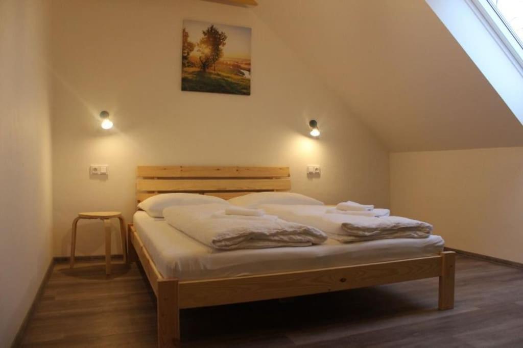 Postel nebo postele na pokoji v ubytování Ubytování Vinohrádky
