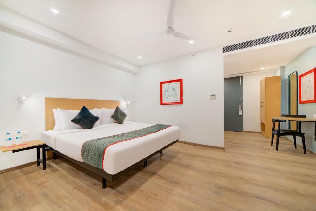 Cama o camas de una habitación en Super Townhouse 777 - A3 empire