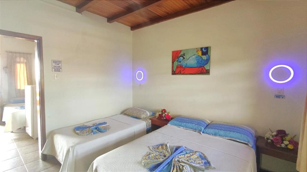 Postel nebo postele na pokoji v ubytování Hotel Cielo Azul