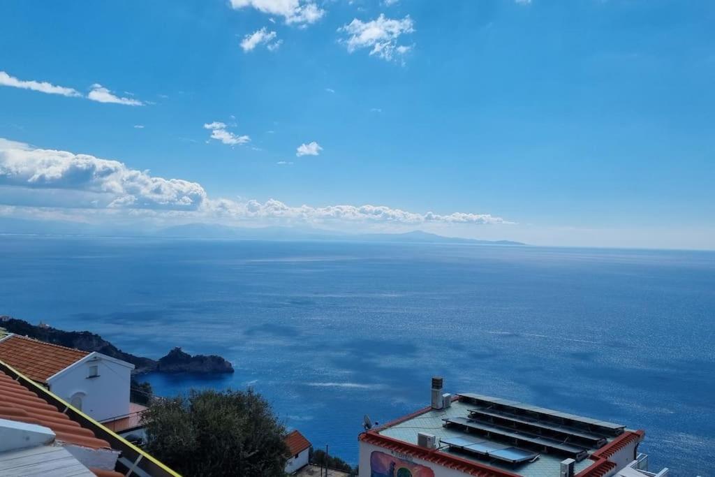 a view of the ocean from a building at Grandmother's Attic in Furore