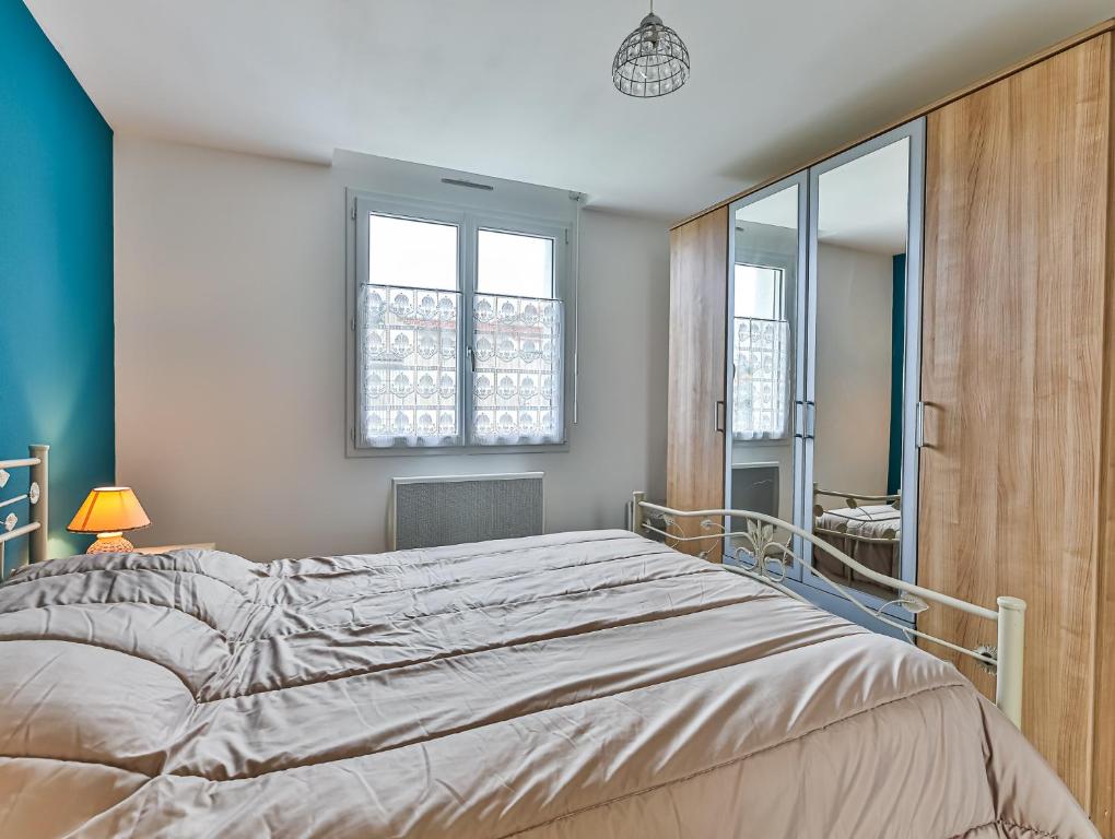 Posteľ alebo postele v izbe v ubytovaní Maison Ker Mona