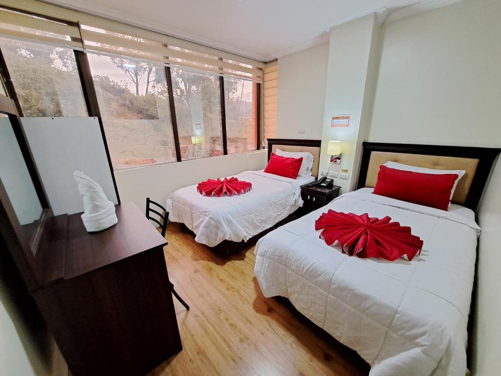 Postel nebo postele na pokoji v ubytování Hotel Loja Bella