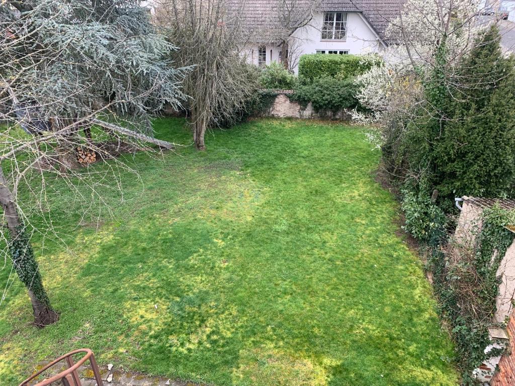 Zahrada ubytování Mainpark Apartment 4 Schlafzimmer bis zu 10 Personen direkt über AschaffApartment bei Aschaffenburg