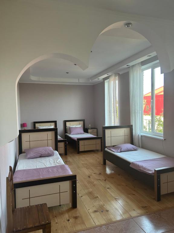 Postel nebo postele na pokoji v ubytování Guesthouse TEA