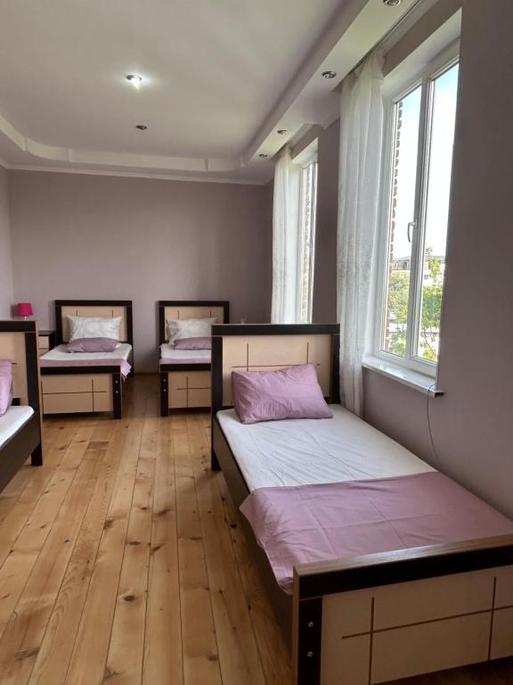 Postel nebo postele na pokoji v ubytování Guesthouse TEA
