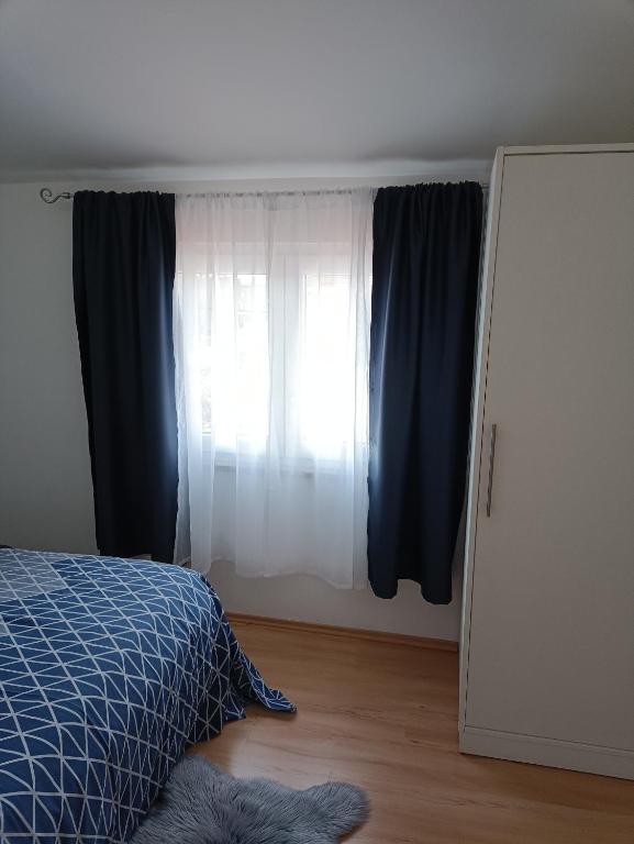 Posteľ alebo postele v izbe v ubytovaní Apartment Dorina