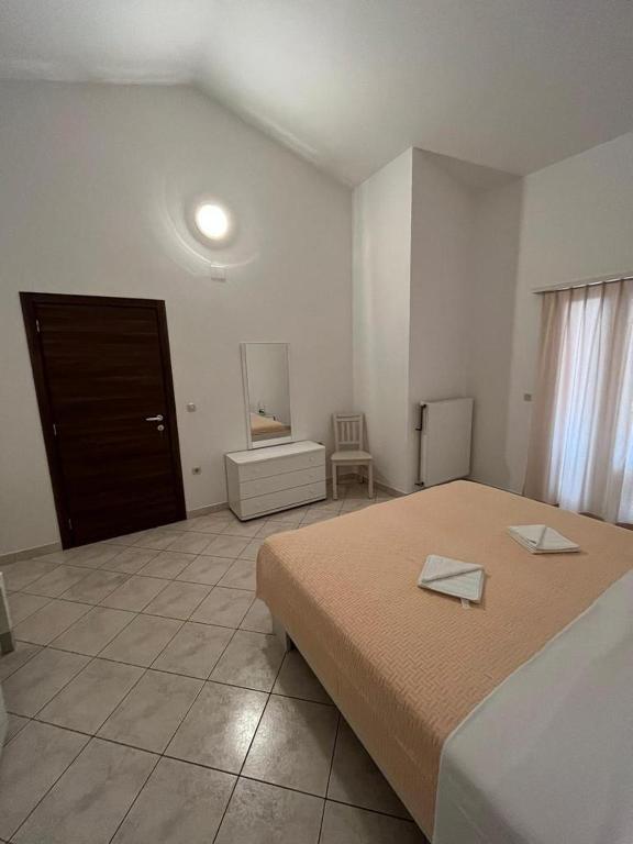 Postel nebo postele na pokoji v ubytování Apartments Filip