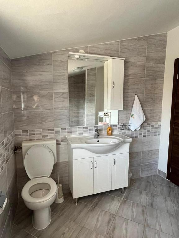 Koupelna v ubytování Apartments Filip