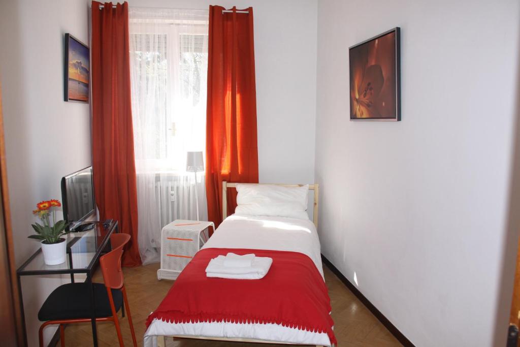 Postel nebo postele na pokoji v ubytování Lotus B&B