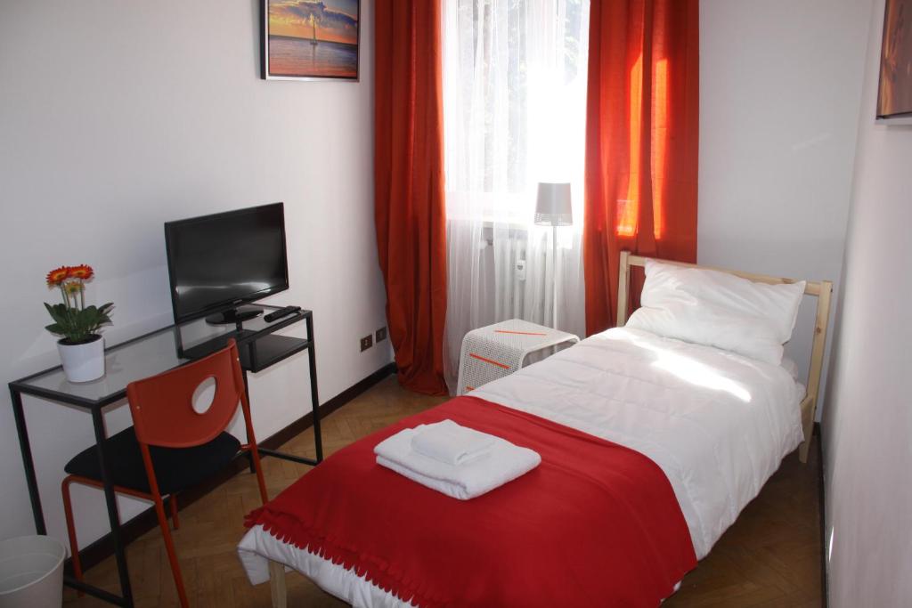 Postel nebo postele na pokoji v ubytování Lotus B&B