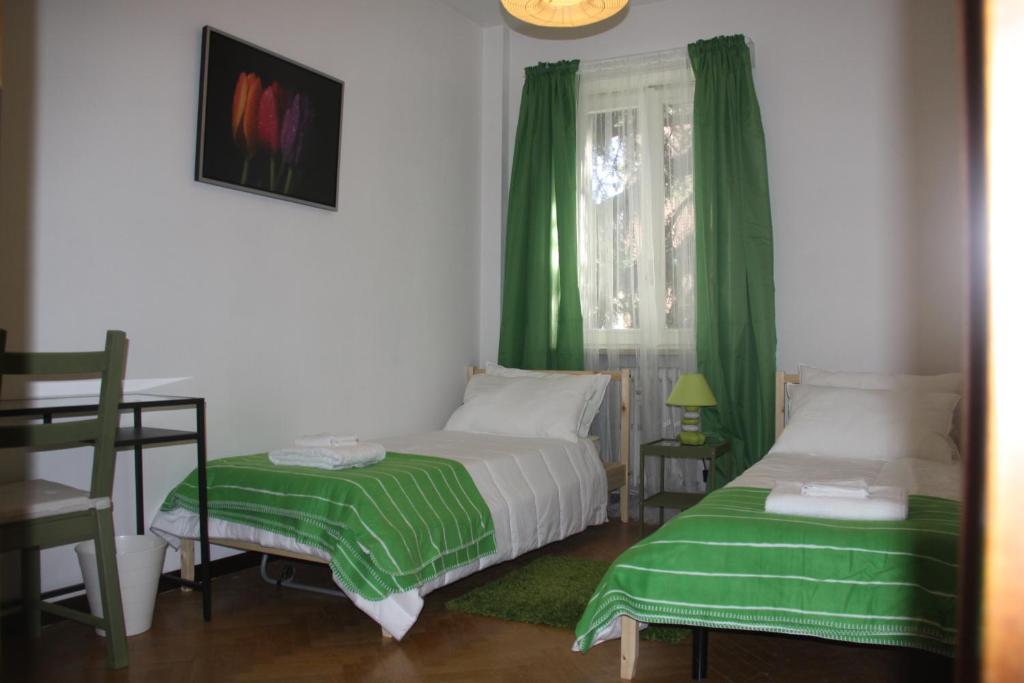 Postel nebo postele na pokoji v ubytování Lotus B&B