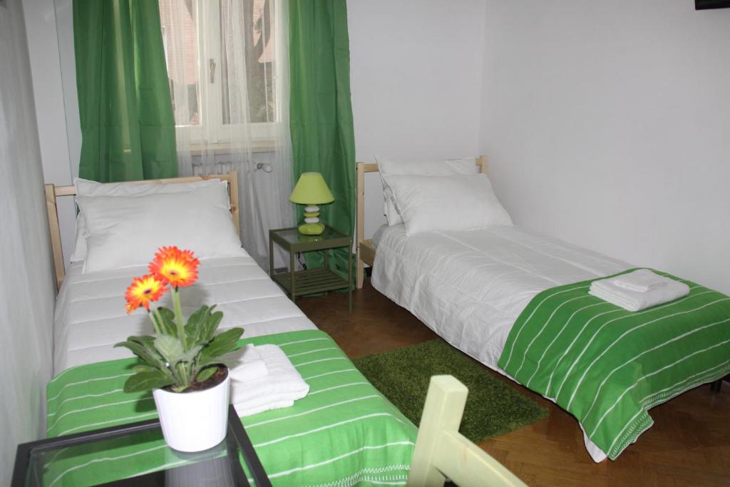 Postel nebo postele na pokoji v ubytování Lotus B&B