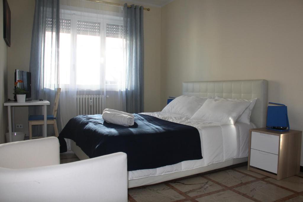Postel nebo postele na pokoji v ubytování Lotus B&B