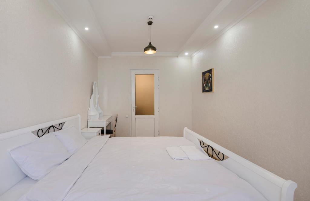 Postel nebo postele na pokoji v ubytování Marcos Hotel