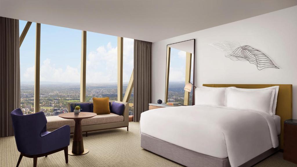 Postel nebo postele na pokoji v ubytování The Ritz-Carlton, Melbourne