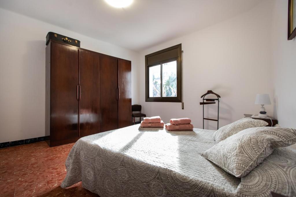 Postel nebo postele na pokoji v ubytování Casa turística Cunit