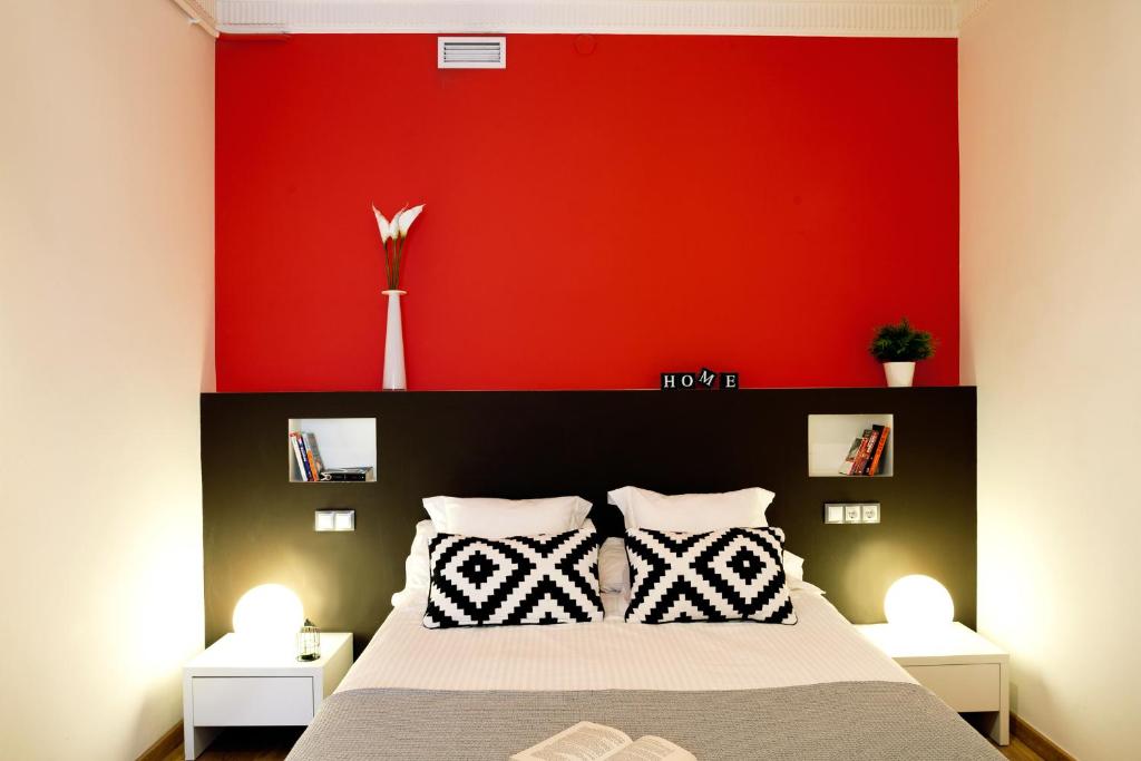 Posteľ alebo postele v izbe v ubytovaní Feelathome Center Apartments