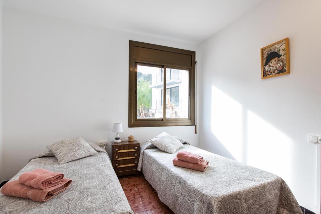 Postel nebo postele na pokoji v ubytování Casa turística Cunit