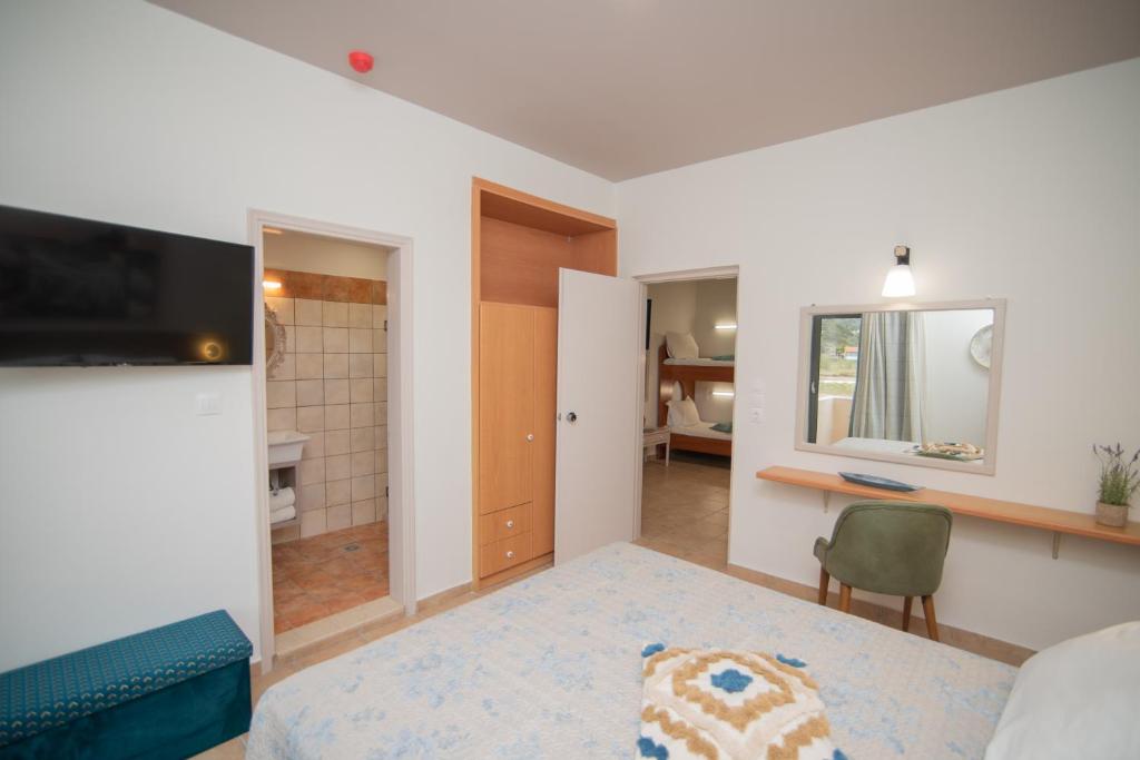TV a/nebo společenská místnost v ubytování Tsaner Apartment and Rooms
